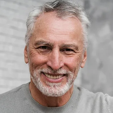 Smiling adult, illustrative photo